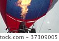 Hot air balloon. Burner directing flame into 37309005