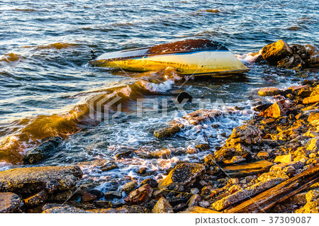 Shipwreck after an winter storm overturned fishing 37309087