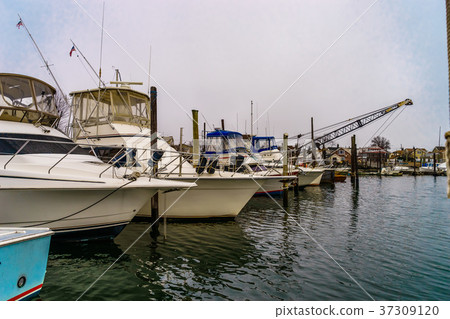 Fishing boats on pier of Jamaica Bay, Brooklyn 37309120