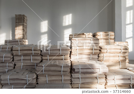 Stacked papers in room Stacked papers in room 37314660