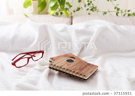 Stylish notebook and glasses Stylish notebook and glasses 37315931