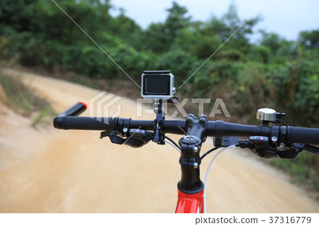 Action camera mounted on mountain bike 37316779