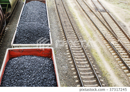 Aerial view on wagons with black coal. 37317245