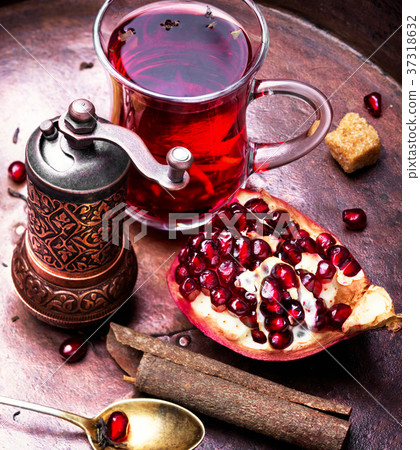 still life with pomegranate tea. still life with pomegranate tea. 37318632