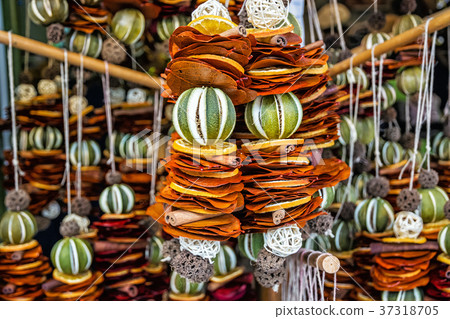 Hanging decoration of dried lime, lemon, cinnamon Hanging decoration of dried lime, lemon, cinnamon 37318705