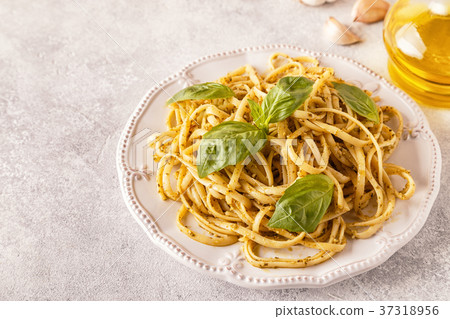 Pasta with homemade pesto sauce. Pasta with homemade pesto sauce. 37318956