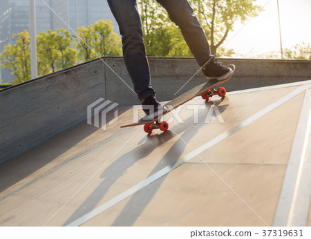 skateboarder legs skateboarding on skatepark ramp skateboarder legs skateboarding on skatepark ramp 37319631