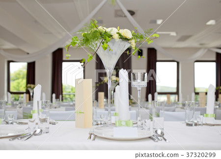 Wedding table with bouquet of roses Wedding table with bouquet of roses 37320299