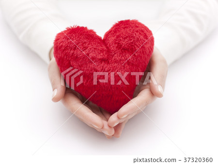 Red heart in woman hands Red heart in woman hands 37320360