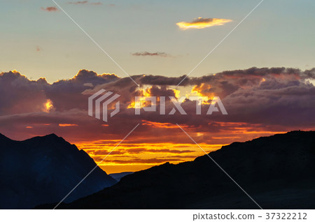 Scenic sunset and sunrise in mountainous region Scenic sunset and sunrise in mountainous region 37322212