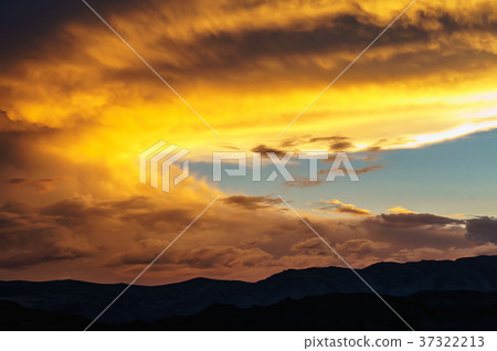 Scenic sunset and sunrise in mountainous region Scenic sunset and sunrise in mountainous region 37322213
