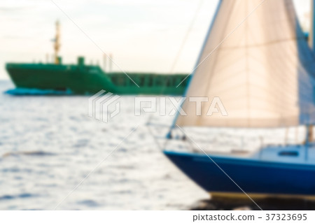 Blue sailboat - blurred image Blue sailboat - blurred image 37323695