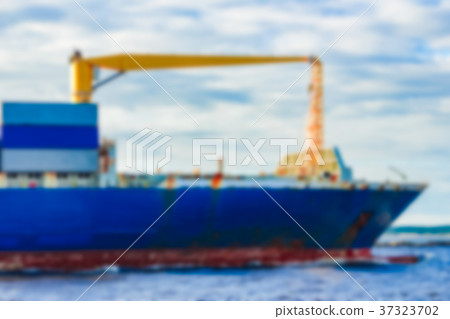 Blue cargo ship - blurred image Blue cargo ship - blurred image 37323702