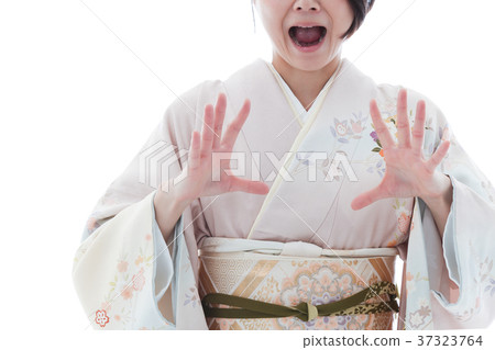 A woman in a kimono A woman in a kimono 37323764
