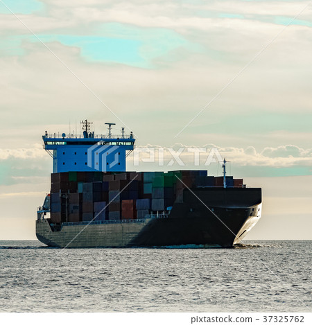 Black container ship underway Black container ship underway 37325762