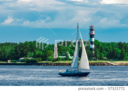 Blue sailboat at river Blue sailboat at river 37325772