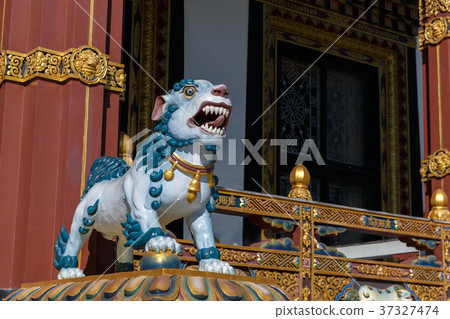 statue of a dog in a Buddhist temple statue of a dog in a Buddhist temple 37327474