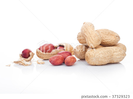Raw peanuts with shell on white background Raw peanuts with shell on white background 37329323