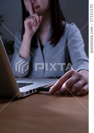 Laptop and USB, woman, put finger on mouth Laptop and USB, woman, put finger on mouth 37331570