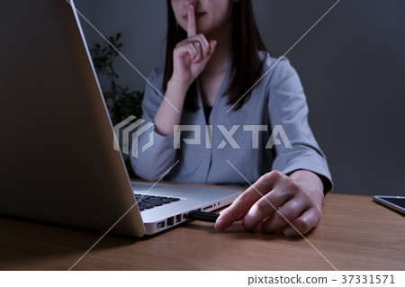 Laptop and USB, woman, put finger on mouth Laptop and USB, woman, put finger on mouth 37331571