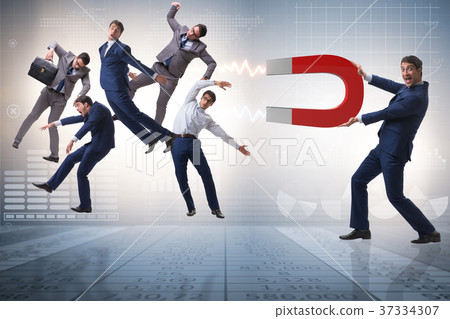 Businessman in recruitment concept with horseshoe Businessman in recruitment concept with horseshoe 37334307