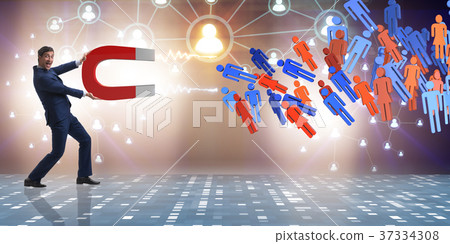 Businessman in recruitment concept with horseshoe Businessman in recruitment concept with horseshoe 37334308