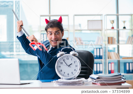 Devil angry businessman in the office 37334899