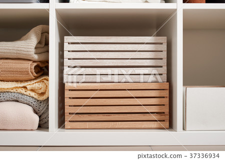 white rack with shelves full of stuff 37336934