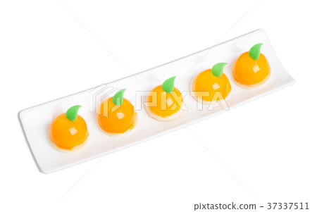 Delicious orange glazed cakes. 37337511