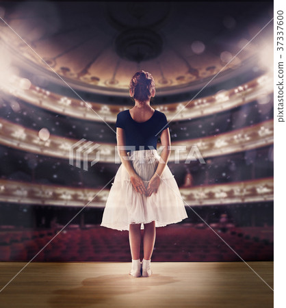 Baby girl dreaming a dancing ballet on the stage Baby girl dreaming a dancing ballet on the stage 37337600