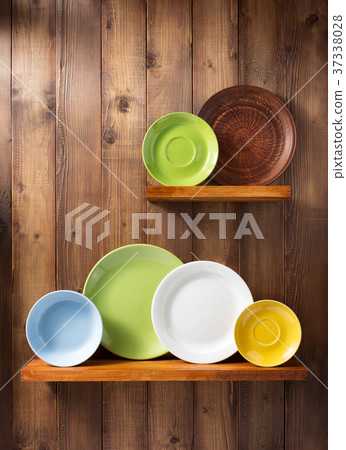 plate at kitchen wooden shelf at wall plate at kitchen wooden shelf at wall 37338028