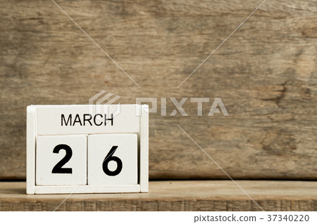 White block calendar present date 26 and March 37340220