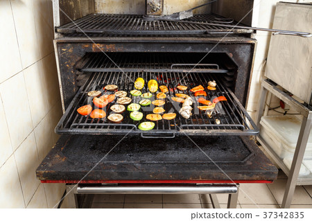 sliced vegetables on the grill 37342835
