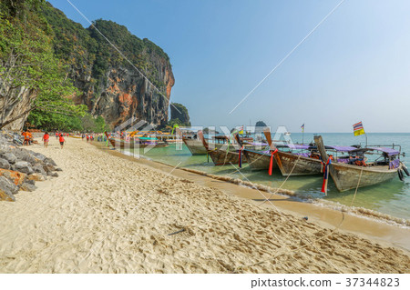 Long tail boats on Railay beach in Krabi Thailand Long tail boats on Railay beach in Krabi Thailand 37344823