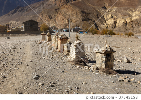 Buddhist chortens on the road 37345158