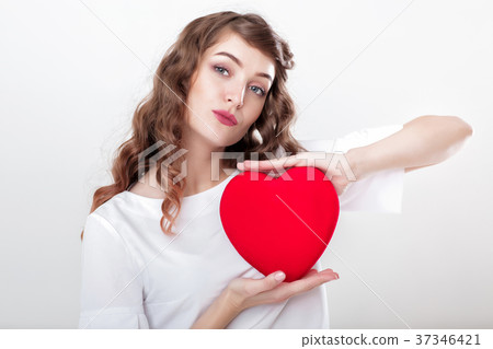 woman holding red heart 37346421