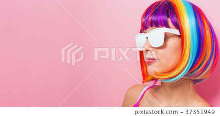Beautiful woman in a colorful wig 37351949