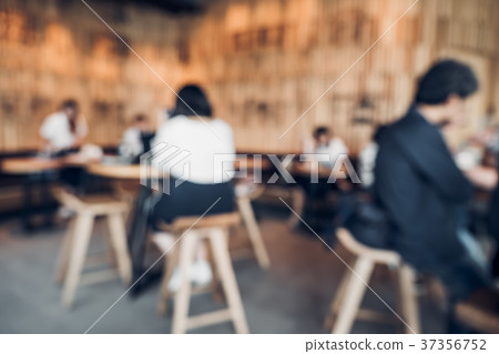 Blurred background of customer sitting in coffee Blurred background of customer sitting in coffee 37356752