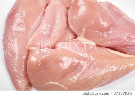 Raw chicken breast fillets isolated on white Raw chicken breast fillets isolated on white 37357020