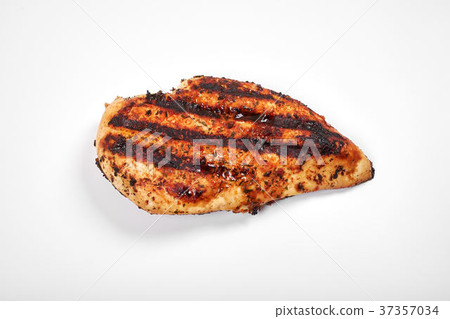 Chicken meat. Grilled fillet pieces isolated on Chicken meat. Grilled fillet pieces isolated on 37357034
