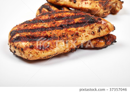 Chicken meat. Grilled fillet pieces isolated on Chicken meat. Grilled fillet pieces isolated on 37357046