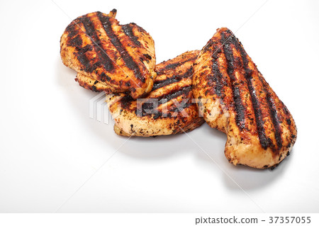 Chicken meat. Grilled fillet pieces isolated on Chicken meat. Grilled fillet pieces isolated on 37357055