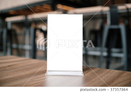 Mock up Menu frame standing on wood table in Mock up Menu frame standing on wood table in 37357864