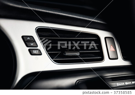 Car air conditioner, interior of a new modern car Car air conditioner, interior of a new modern car 37358585