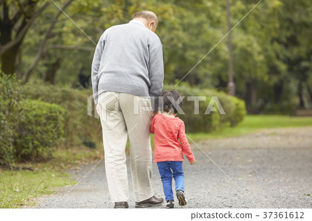 Senior playing with grandson Senior playing with grandson 37361612