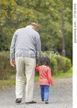 Senior playing with grandson 37361650