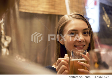 Foreign women enjoying alcohol Foreign women enjoying alcohol 37361876