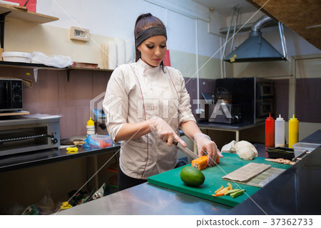 female chef preparing a sushi restaurant in the female chef preparing a sushi restaurant in the 37362733