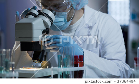 Lab technician conducting researches based on Lab technician conducting researches based on 37364494