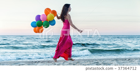 Woman running on the sea 37364712